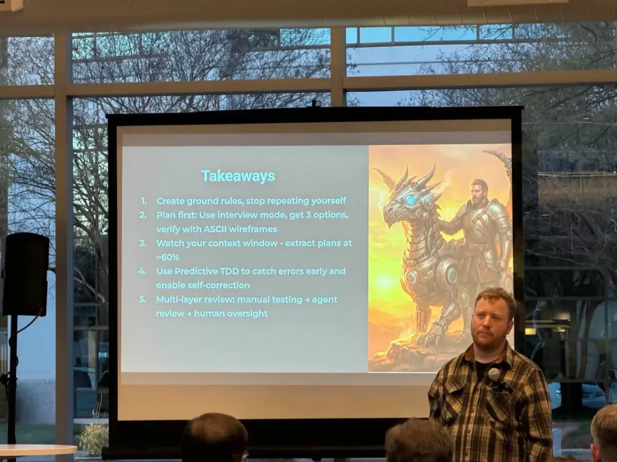 Steven Diamante presenting his 'Taming the Dragon' talk on AI coding agents to a room of engineers